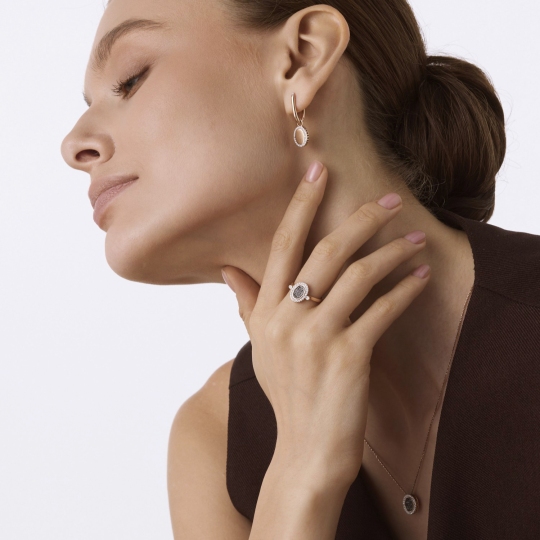 Кольцо-трансформер из золота с бриллиантами и черными бриллиантами