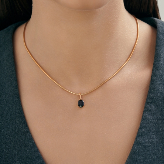 Подвеска из серебра с позолотой и гранатом