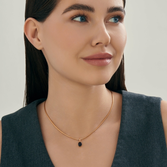 Подвеска из серебра с позолотой и гранатом