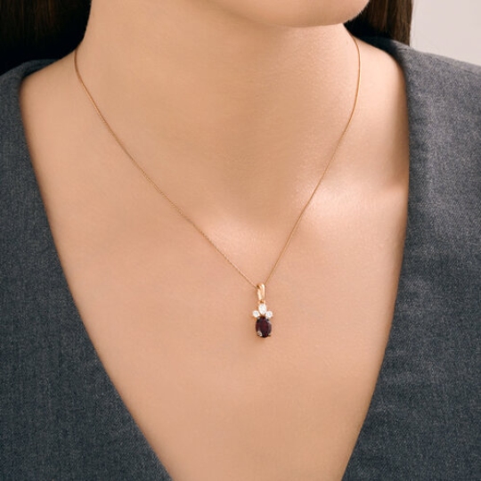 Подвеска из серебра с позолотой, гранатом и фианитами