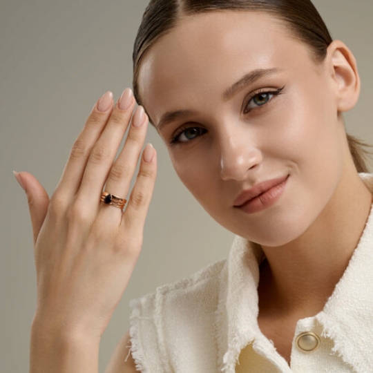 Кольцо из серебра с позолотой и гранатом